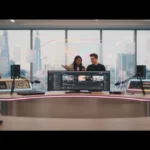 Vibrant UK TikTok studio with London accents and floating TikTok UI icons in a bright cinematic creator workspace.